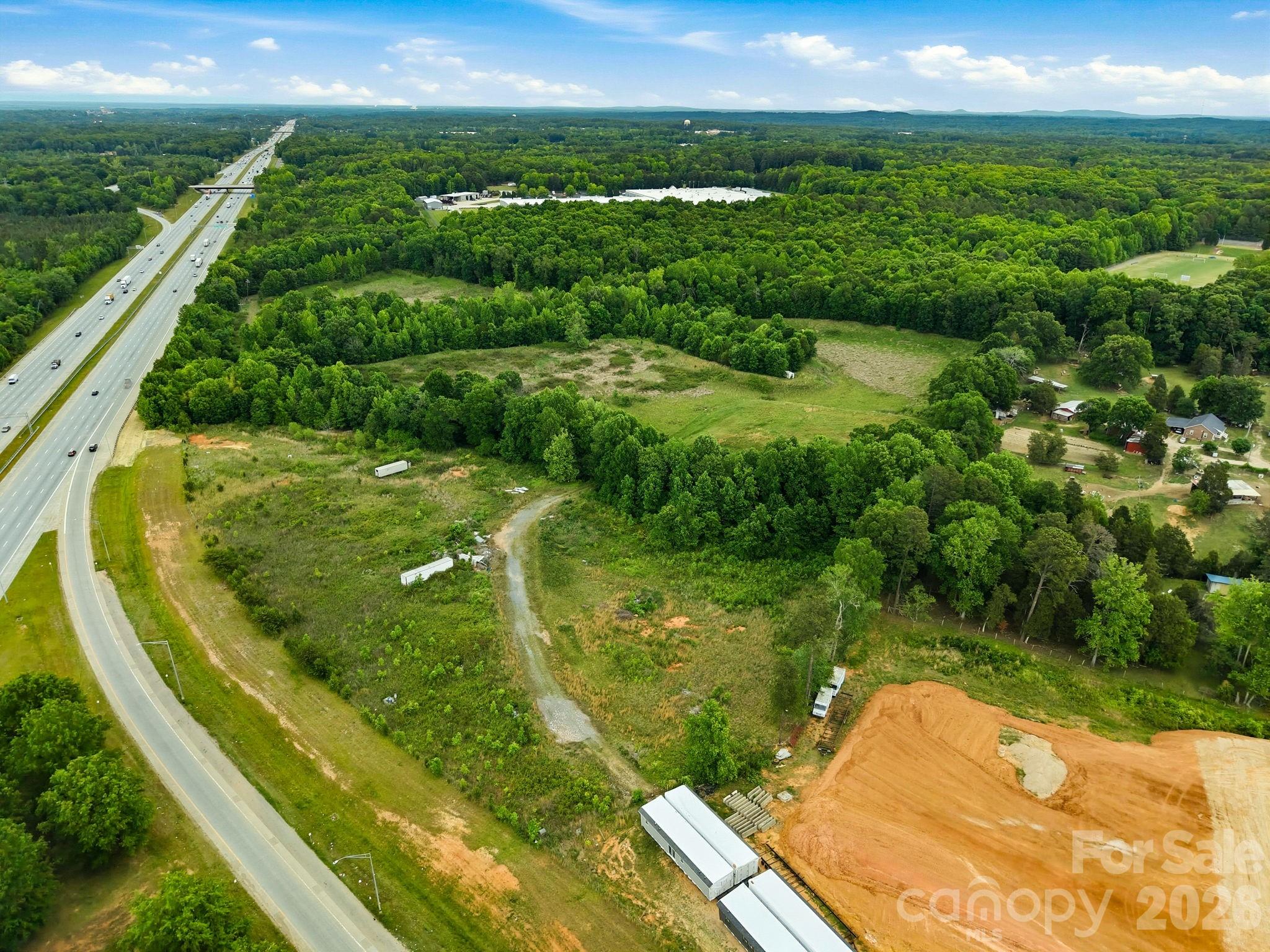 1140 Peeler Road Salisbury, NC 28146 - Photo 2 of 15 a view of a lake from a balcony