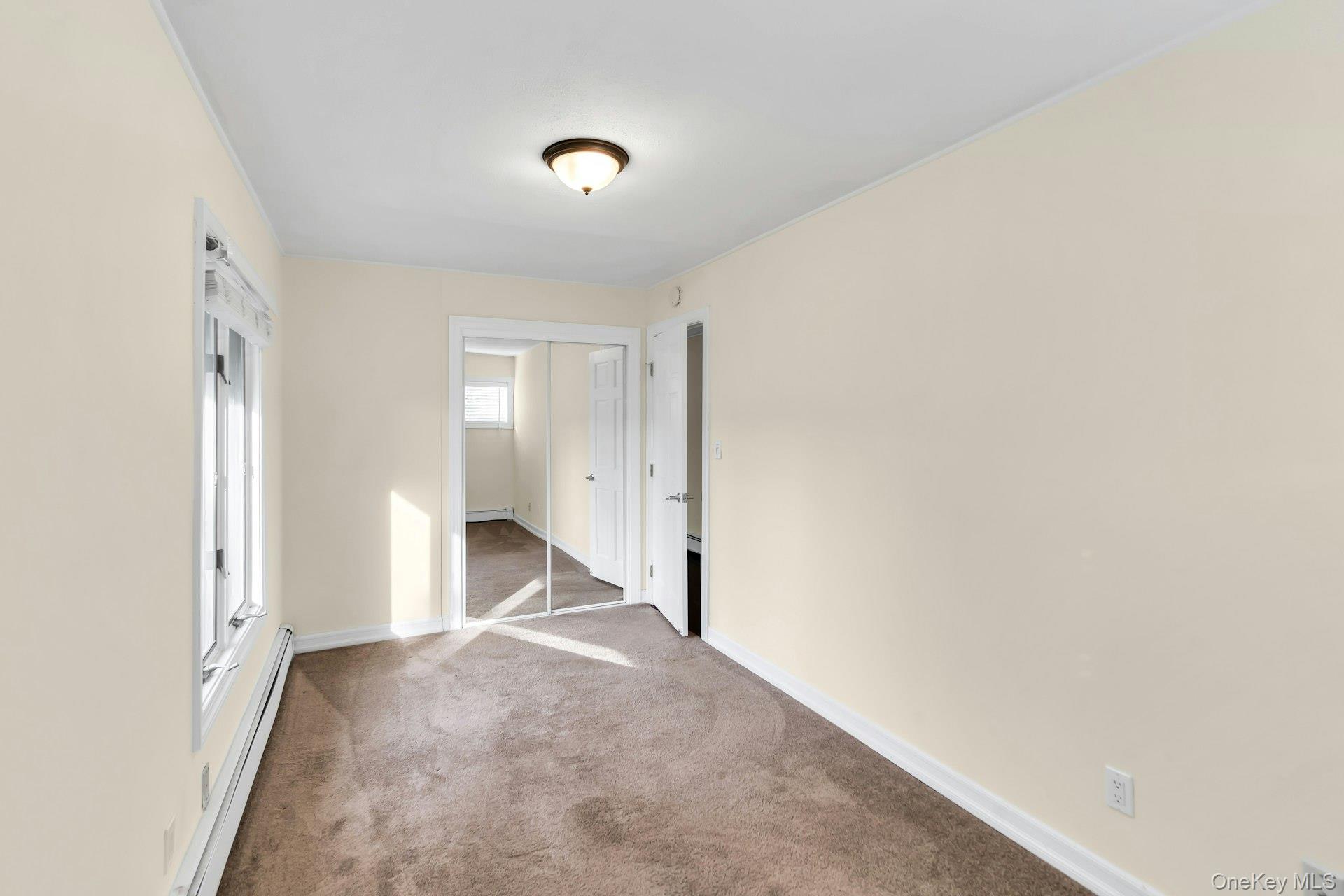 4 Greenway Drive Syosset, NY 11791 - Photo 18 of 29 a view of a livingroom with wooden floor and a sink