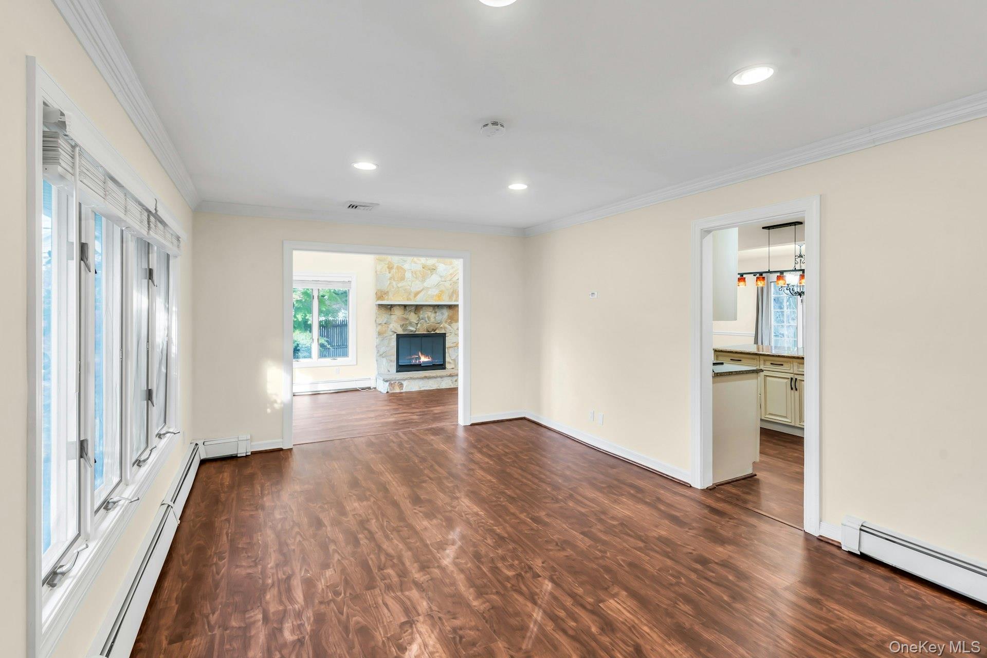 4 Greenway Drive Syosset, NY 11791 - Photo 7 of 29 wooden floor in an empty room with a window