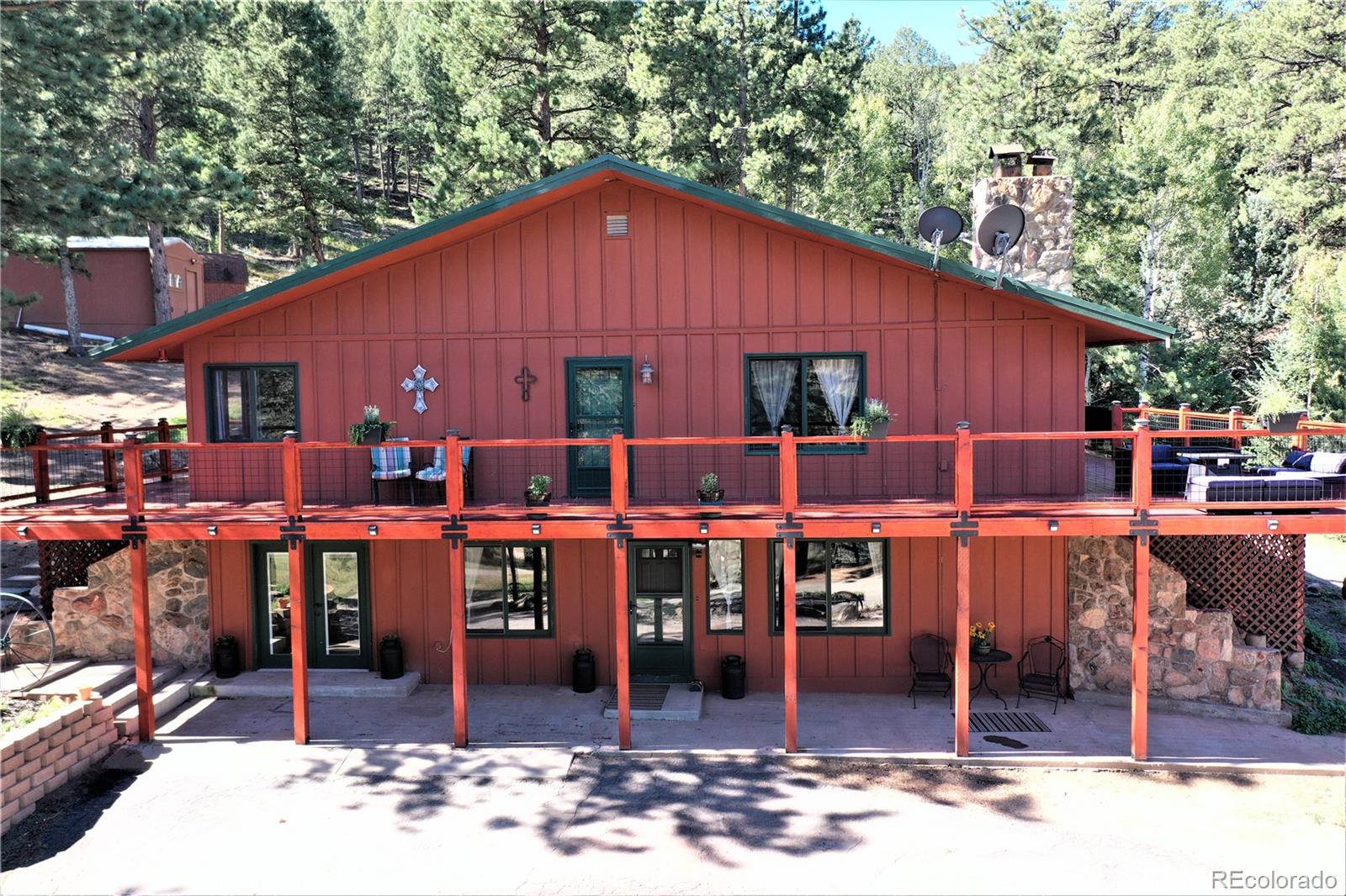 336 County Road 64 Shawnee, CO 80475 - Photo 1 of 40 a view of a dinning table and chairs in the patio