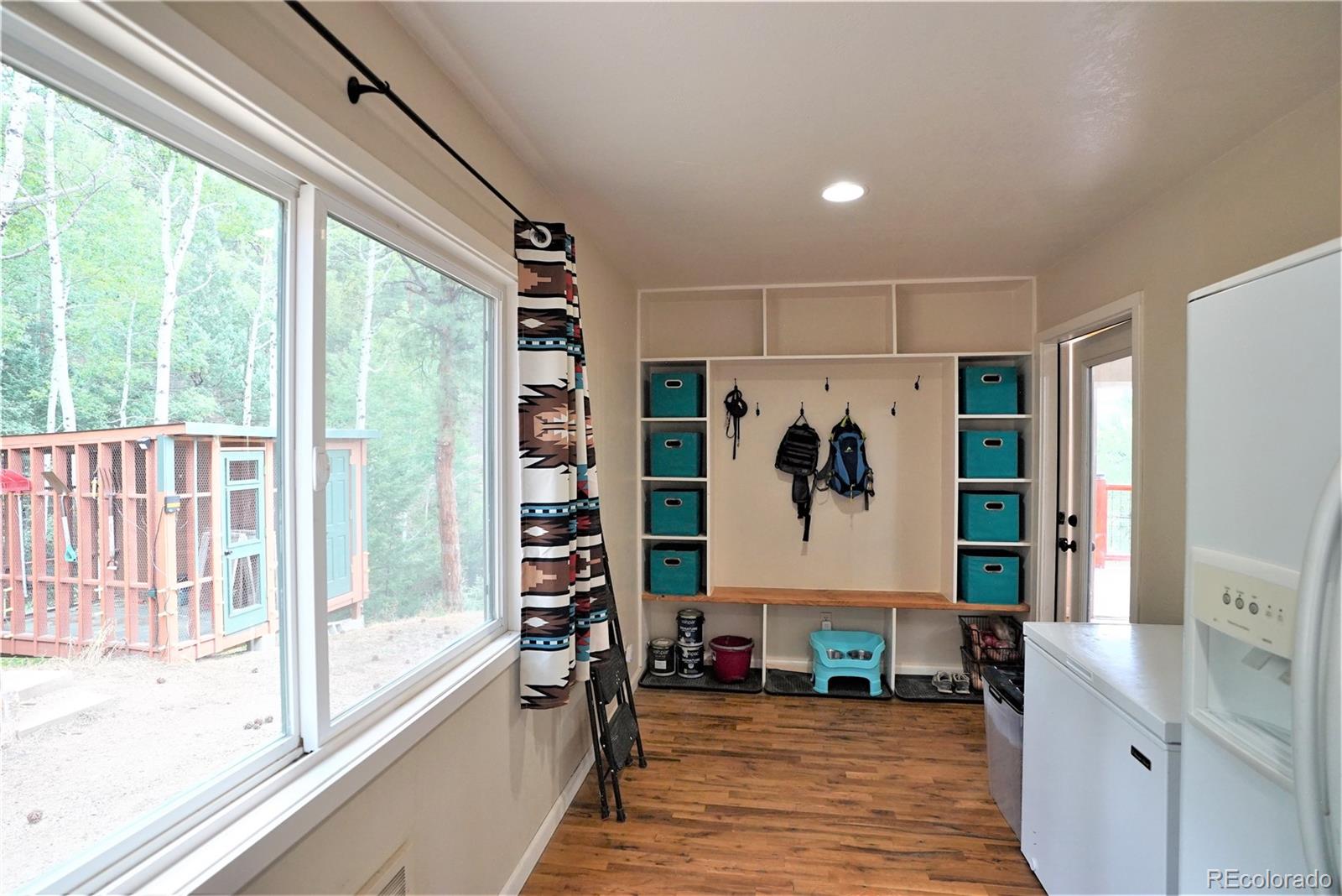 336 County Road 64 Shawnee, CO 80475 - Photo 11 of 40 a view of a living room filled with furniture