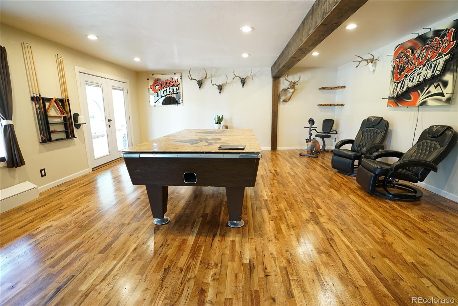 336 County Road 64 Shawnee, CO 80475 - Photo 24 of 40 a living room with kitchen island dining table and wooden floor