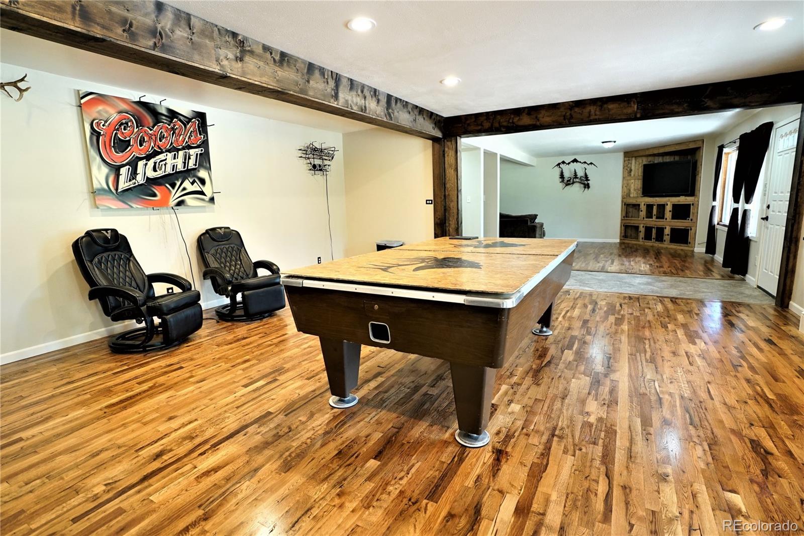 336 County Road 64 Shawnee, CO 80475 - Photo 25 of 40 a view of a dining room with furniture window and wooden floor