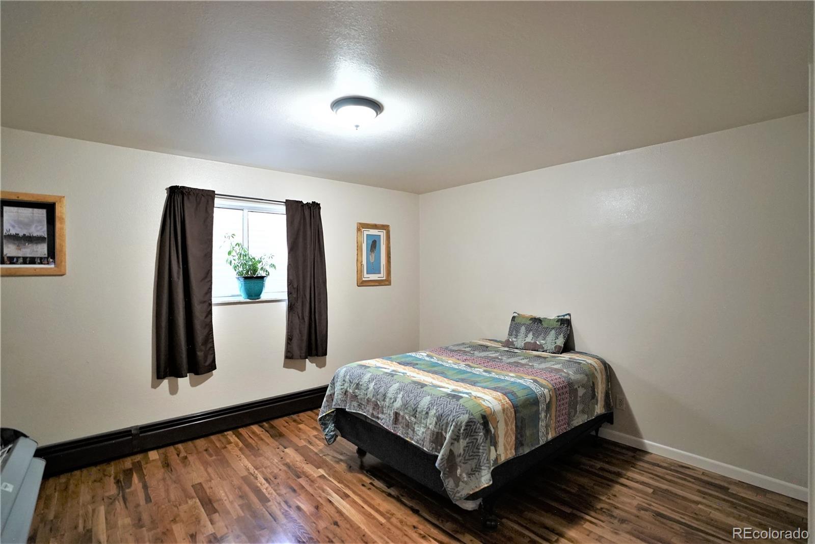 336 County Road 64 Shawnee, CO 80475 - Photo 27 of 40 a bedroom with a bed and window
