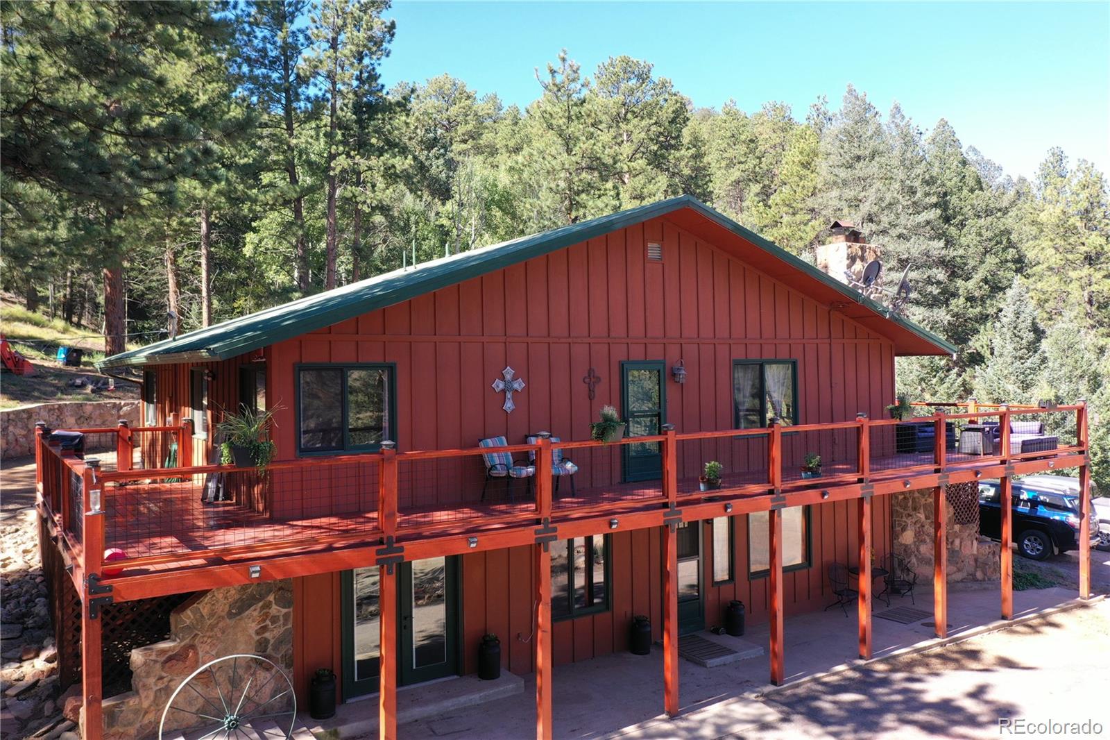 336 County Road 64 Shawnee, CO 80475 - Photo 3 of 40 a view of a chairs and table in the patio