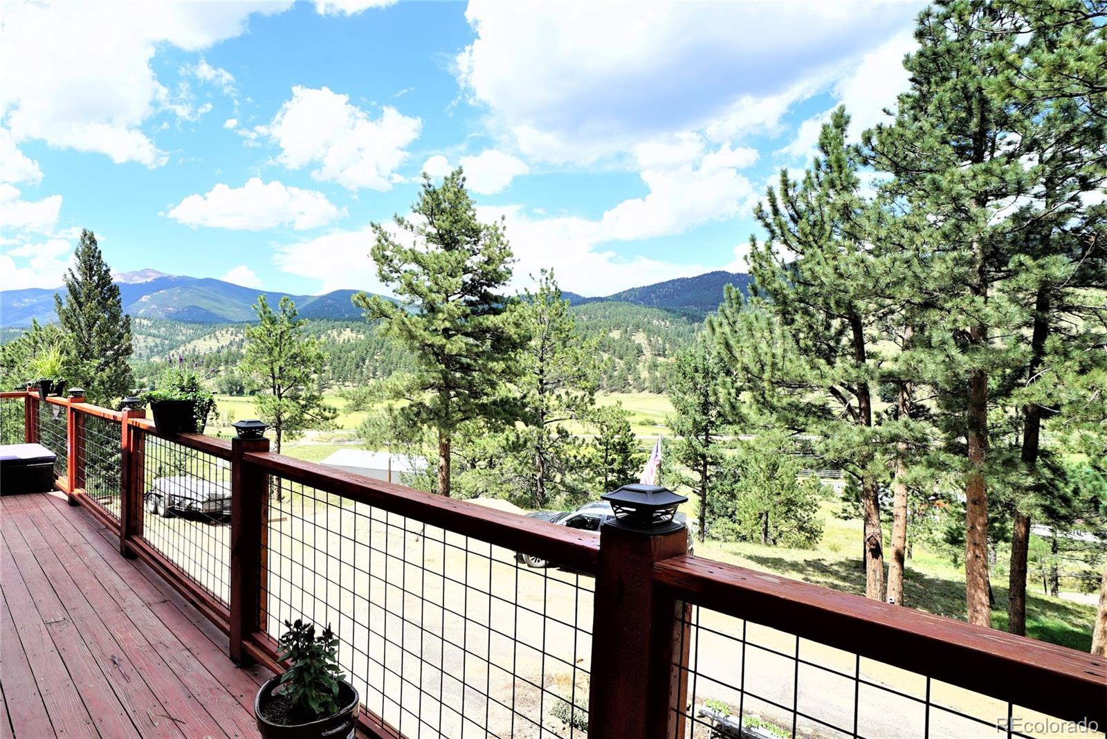 336 County Road 64 Shawnee, CO 80475 - Photo 32 of 40 a view of a balcony with wooden fence and floor