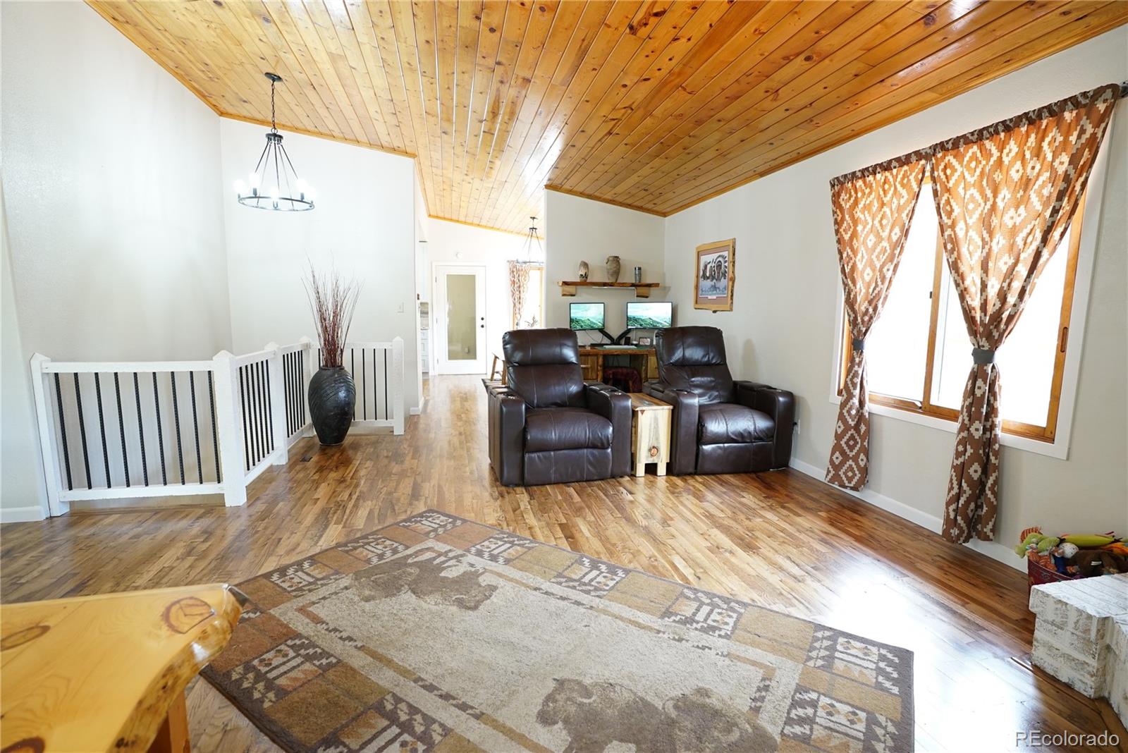 336 County Road 64 Shawnee, CO 80475 - Photo 8 of 40 a living room with furniture and a large window