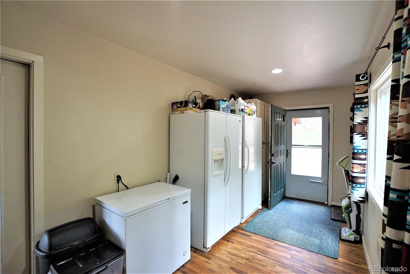 336 County Road 64 Shawnee, CO 80475 - Photo 9 of 40 a view of a storage & utility room with closet dryer and washer