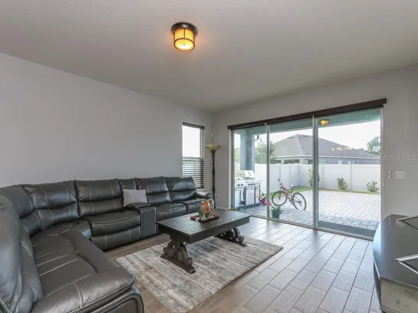 a living room with furniture and a couch