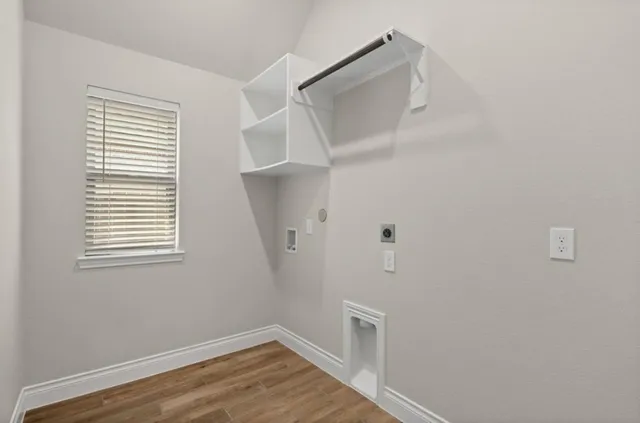 a view of a room that has a window