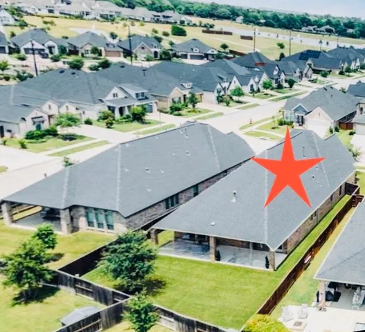 a view of a park with large trees