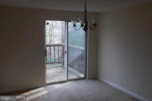 a view of a room that has a window in it