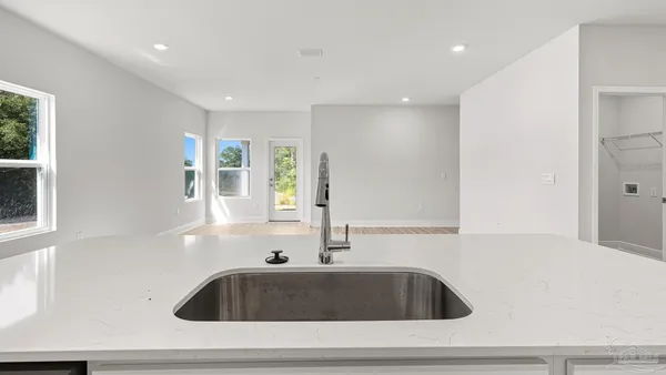 a bathroom with a sink and bathtub