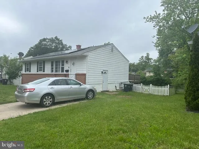 a car parked in front of a house