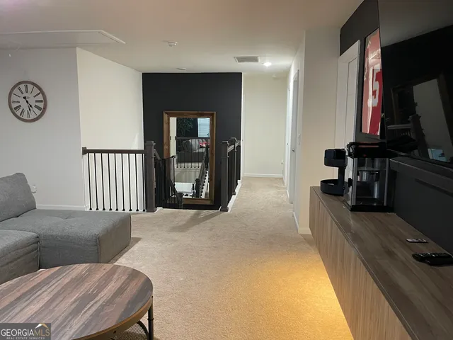 a bedroom with a bed and furniture