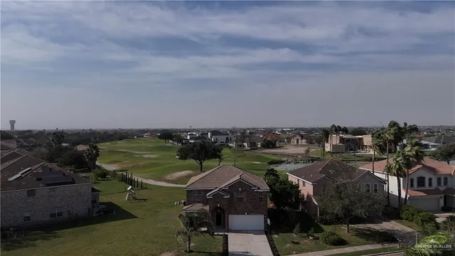 an aerial view of a yard with horses