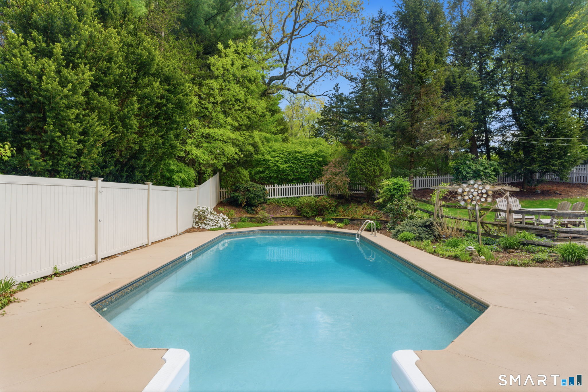 79 Buckboard Lane Bristol, CT 06010 - Photo 8 of 40 a view of a pool in a backyard