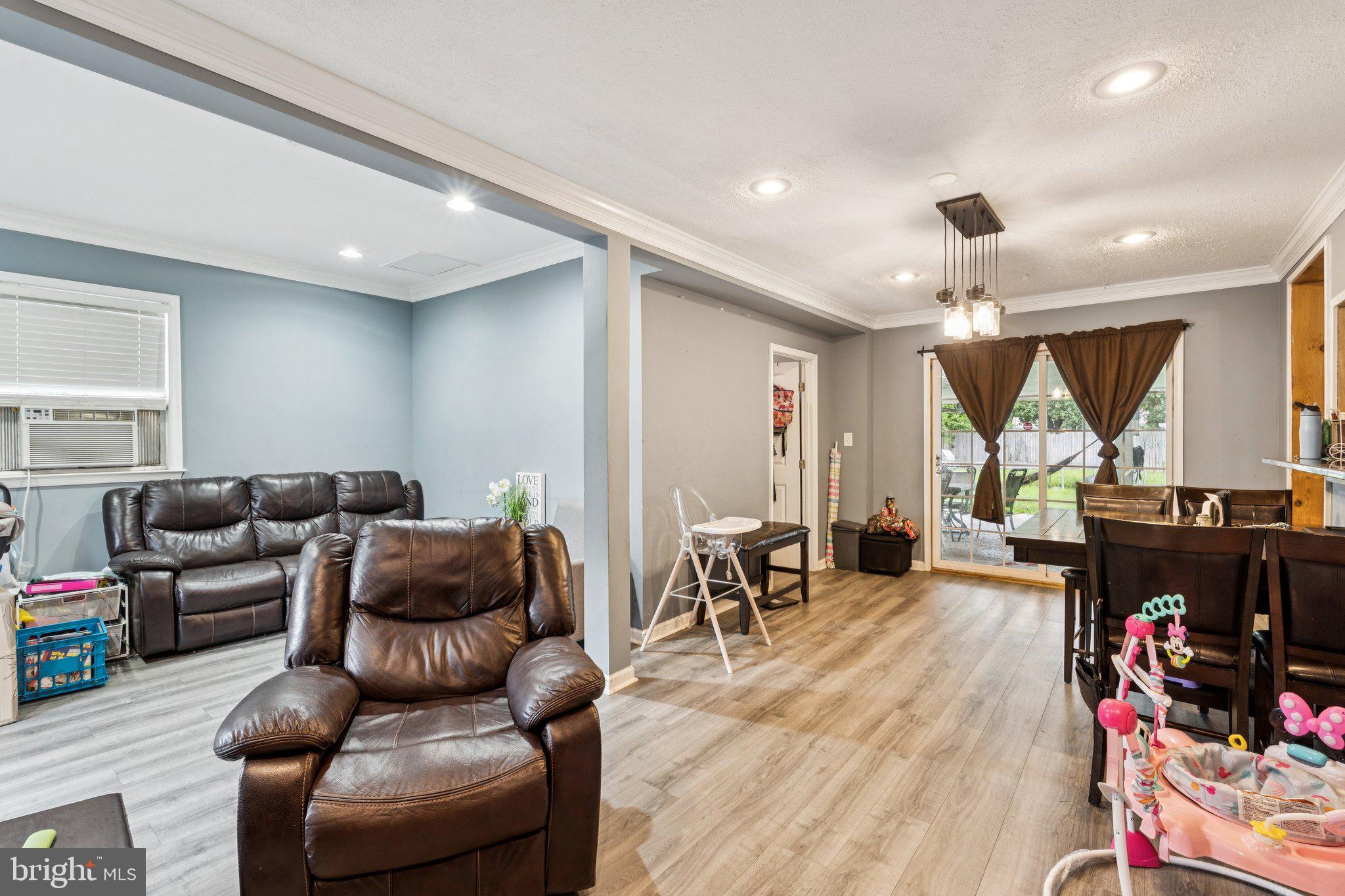 805 North York Road Sterling, VA 20164 - Photo 4 of 17 a living room with furniture and a large window