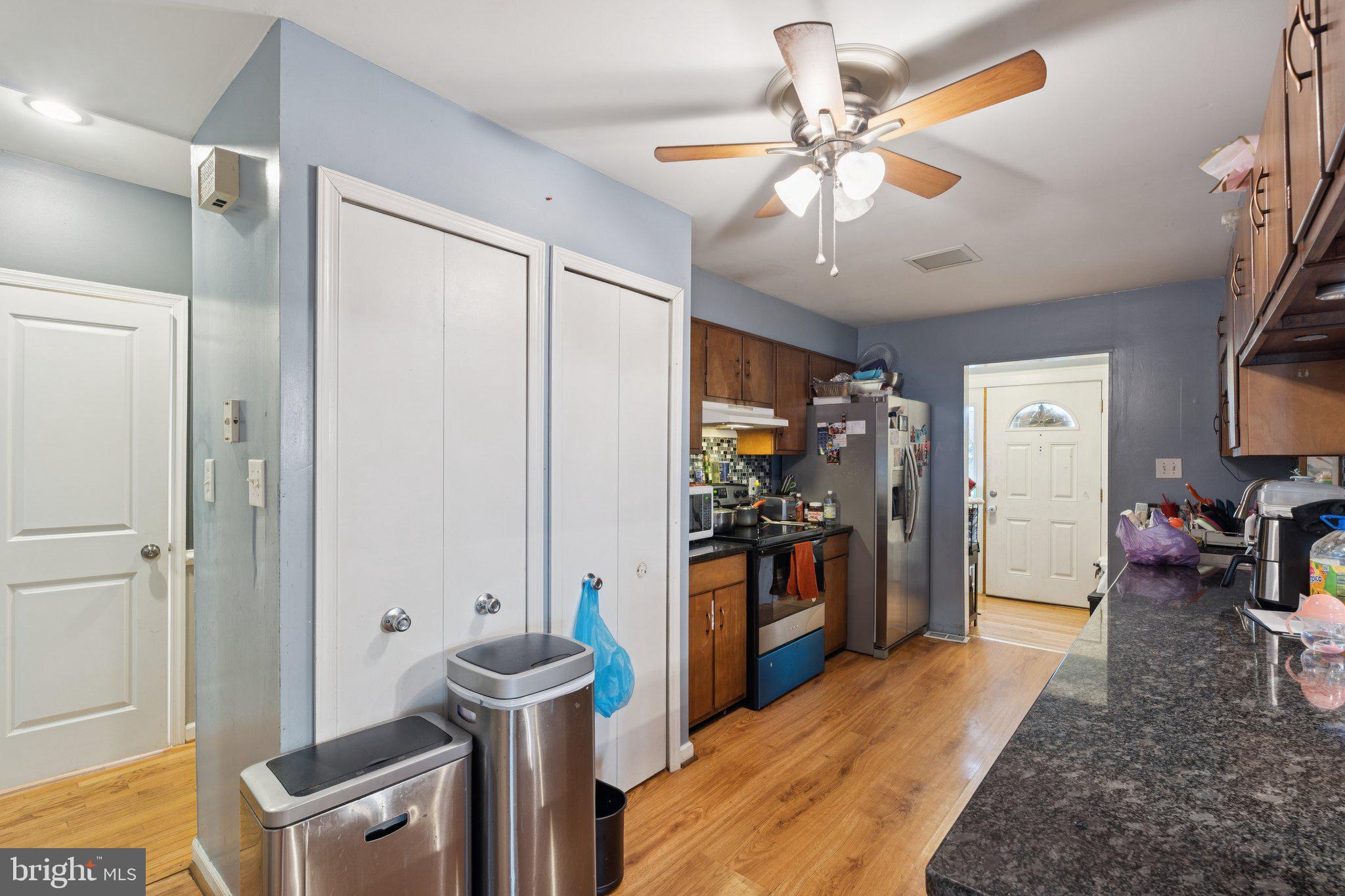 805 North York Road Sterling, VA 20164 - Photo 8 of 17 a view of a kitchen with refrigerator and workspace