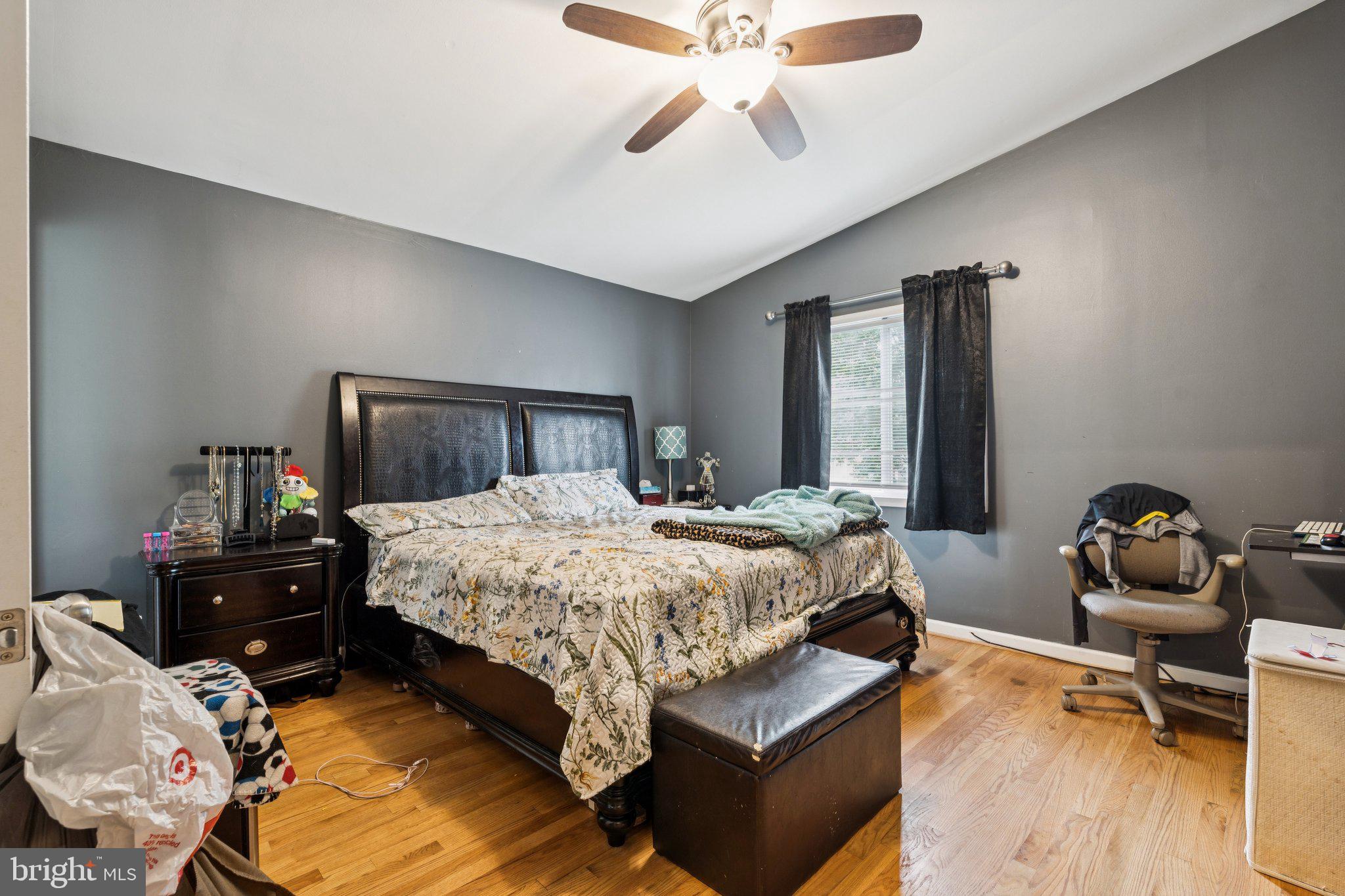 805 North York Road Sterling, VA 20164 - Photo 10 of 17 a bedroom with a bed and wooden floor