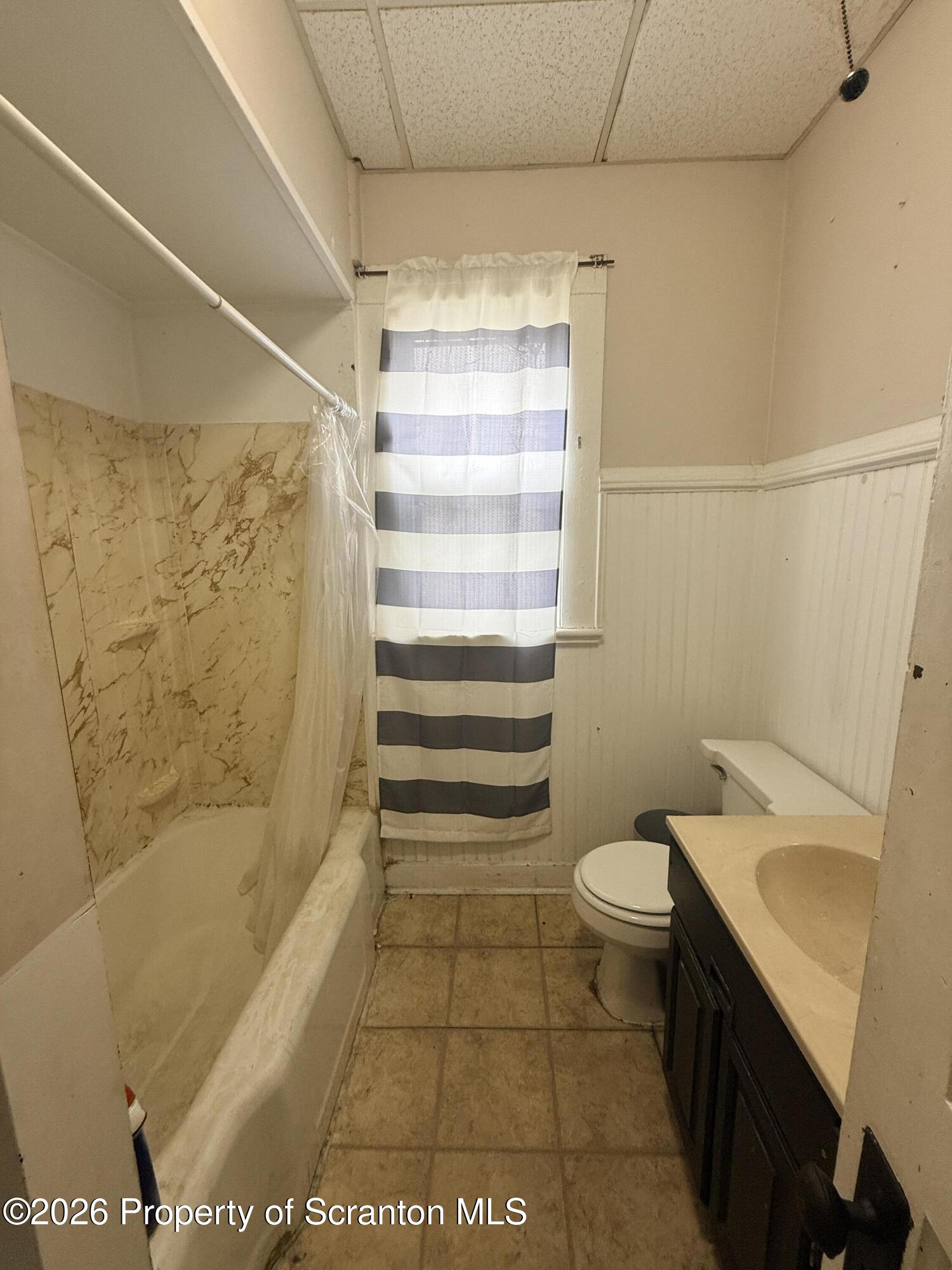 2045 Edna Avenue Scranton, PA 18508 - Photo 18 of 44 a bathroom with a sink a toilet and shower