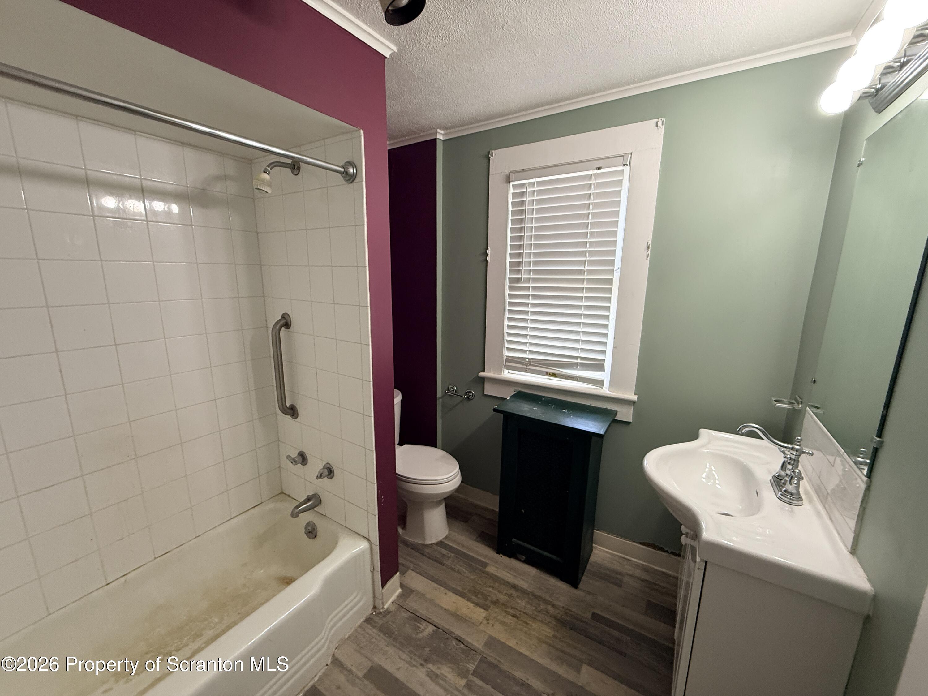 2045 Edna Avenue Scranton, PA 18508 - Photo 29 of 44 a bathroom with a sink toilet and shower