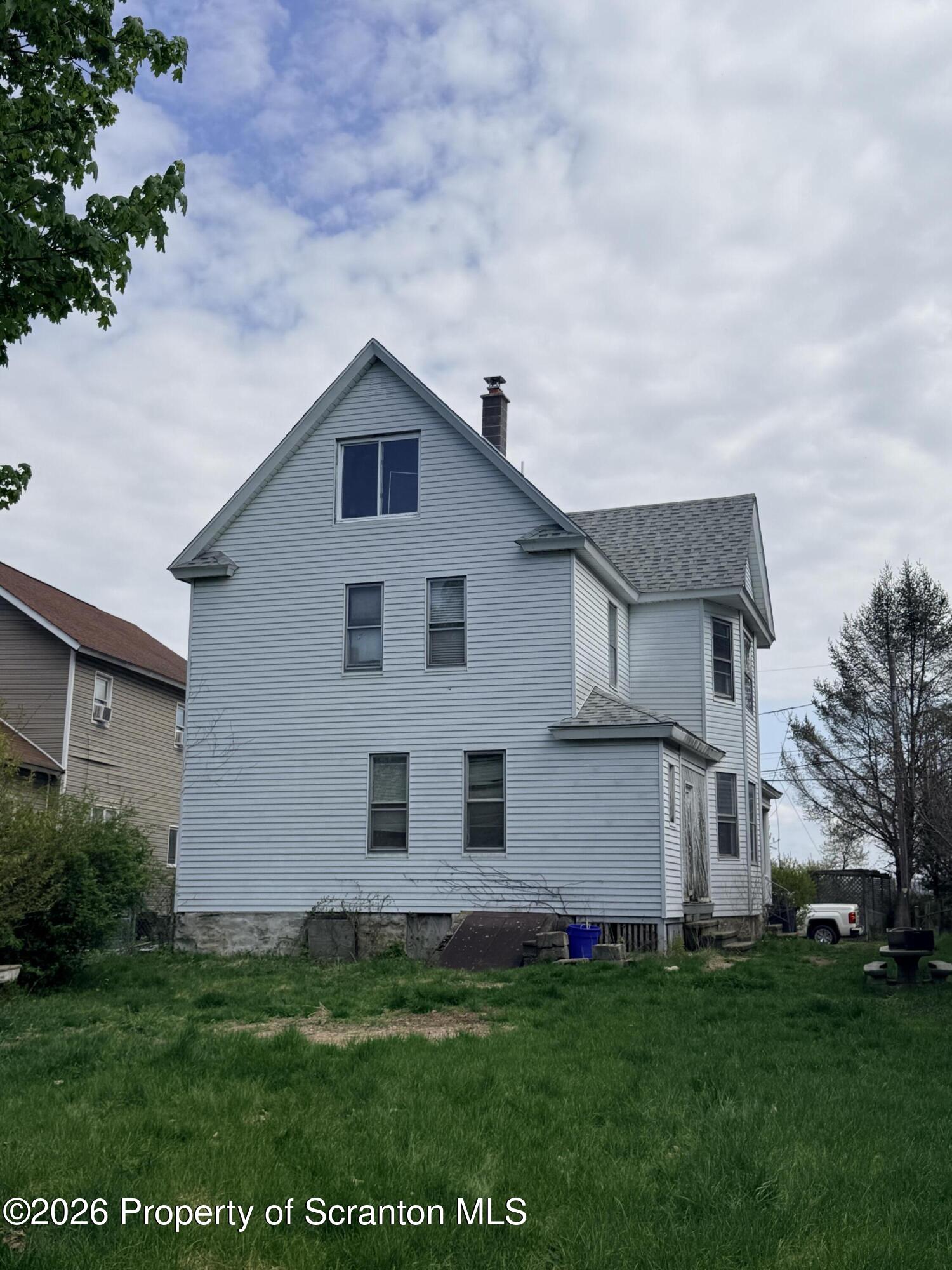 2045 Edna Avenue Scranton, PA 18508 - Photo 40 of 44 a view of a house with a yard