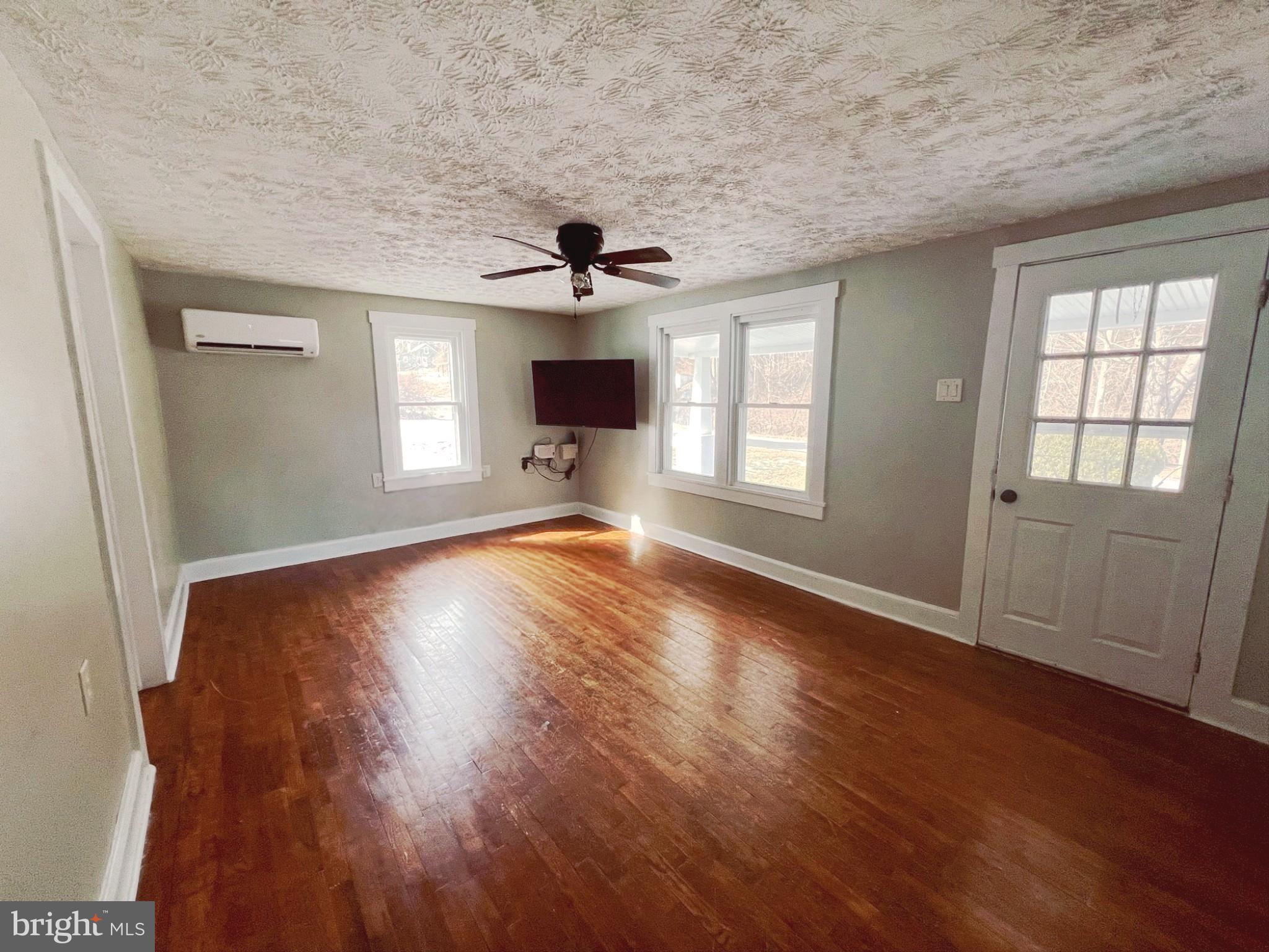 771 Arkansaw Road Baker, WV 26801 - Photo 2 of 29 Enter into the actual living room.