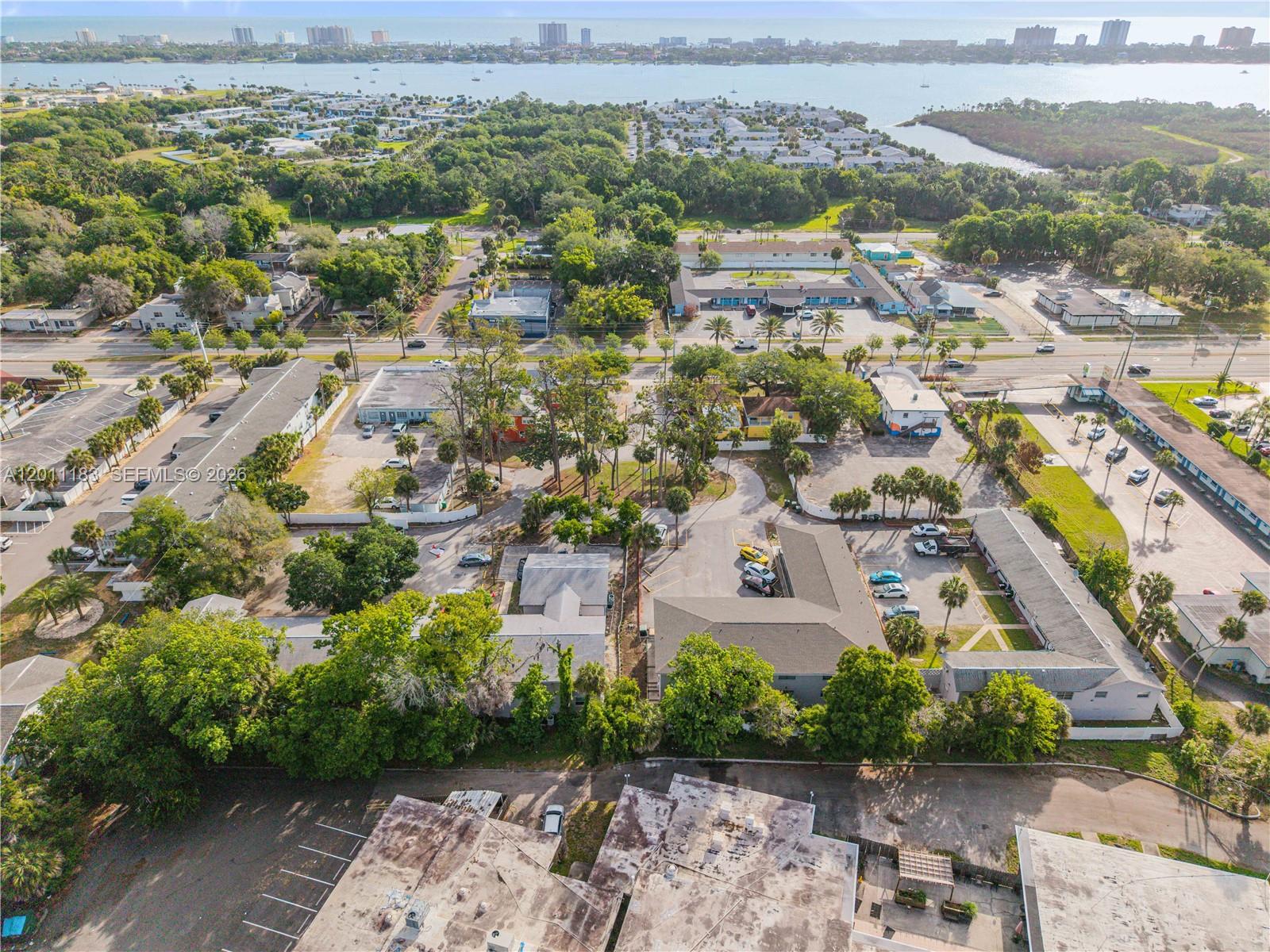 1208 South Ridgewood Avenue Daytona Beach, FL 32114 - Photo 23 of 27 an aerial view of multiple house