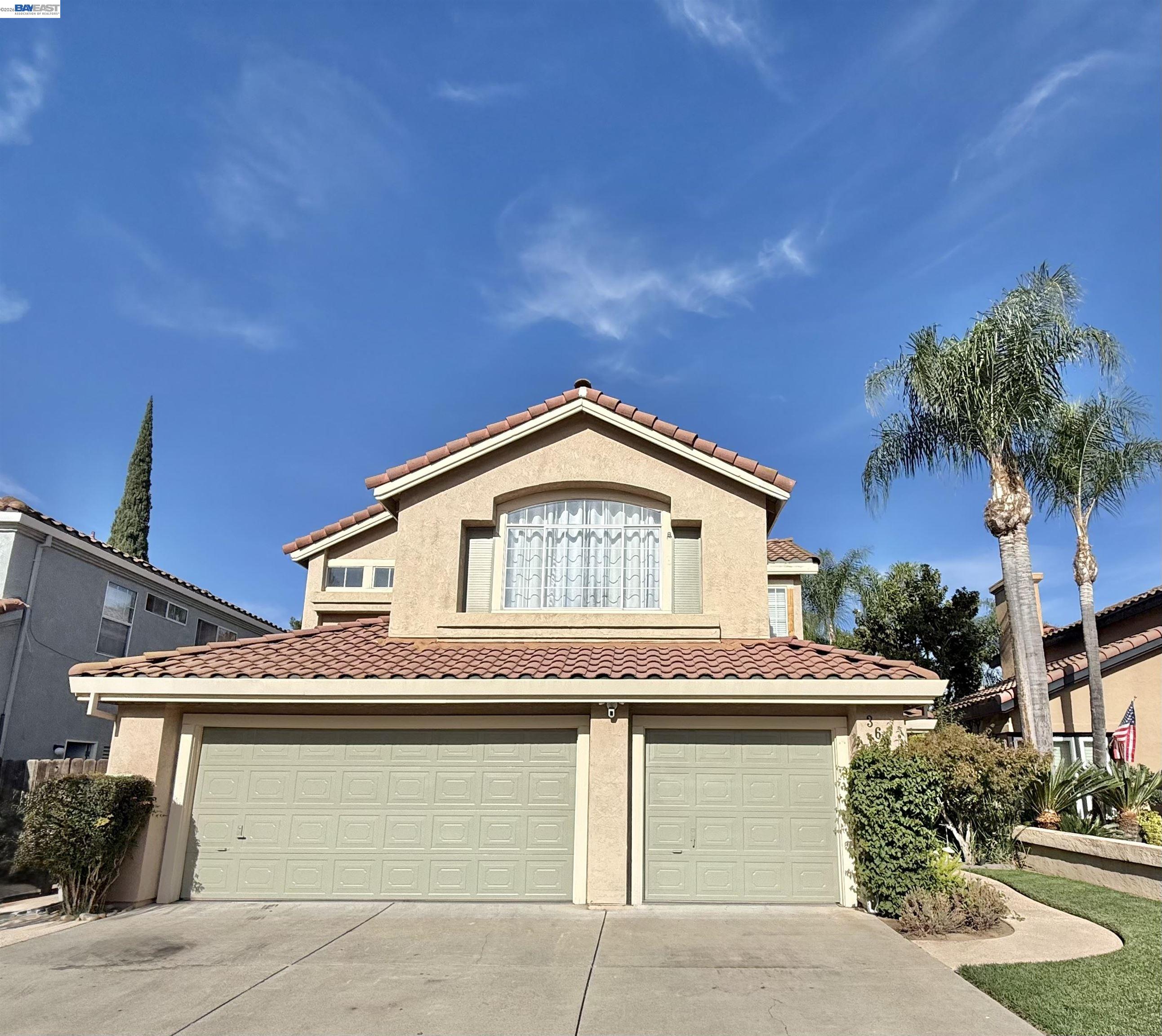 3601 Balfour Lane Modesto, CA 95357 - Photo 1 of 1 a front view of a house with a garage