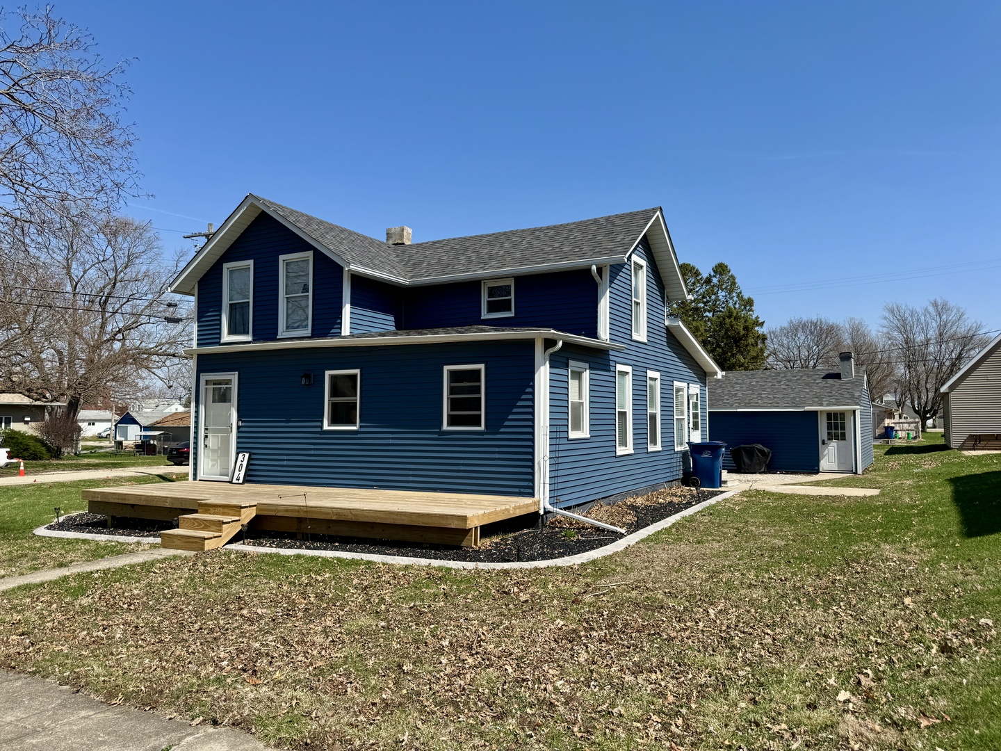 304 South Church Street Sheffield, IL 61361 - Photo 1 of 23 a front view of a house with a yard