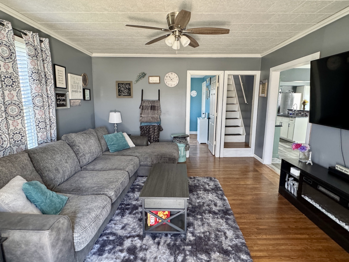 304 South Church Street Sheffield, IL 61361 - Photo 12 of 23 a living room with furniture and a flat screen tv