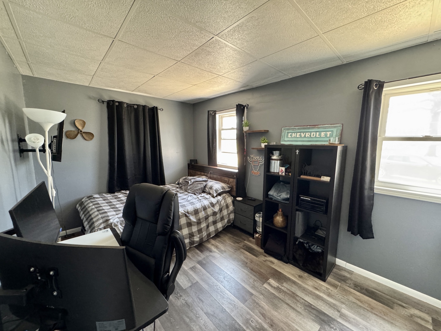 304 South Church Street Sheffield, IL 61361 - Photo 14 of 23 a bedroom with furniture and a wooden floor