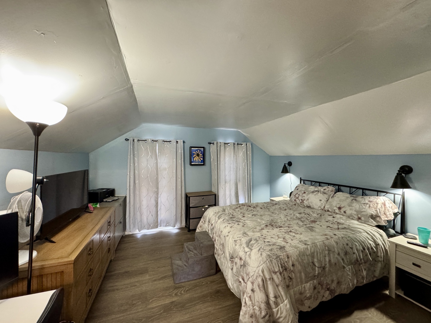 304 South Church Street Sheffield, IL 61361 - Photo 18 of 23 a bed room with a bed mirror and a night stand