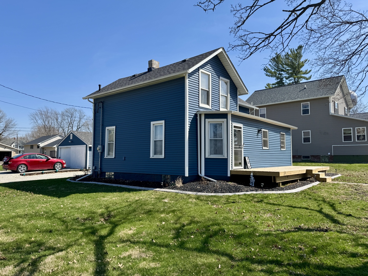 304 South Church Street Sheffield, IL 61361 - Photo 21 of 23 a front view of a house with a yard
