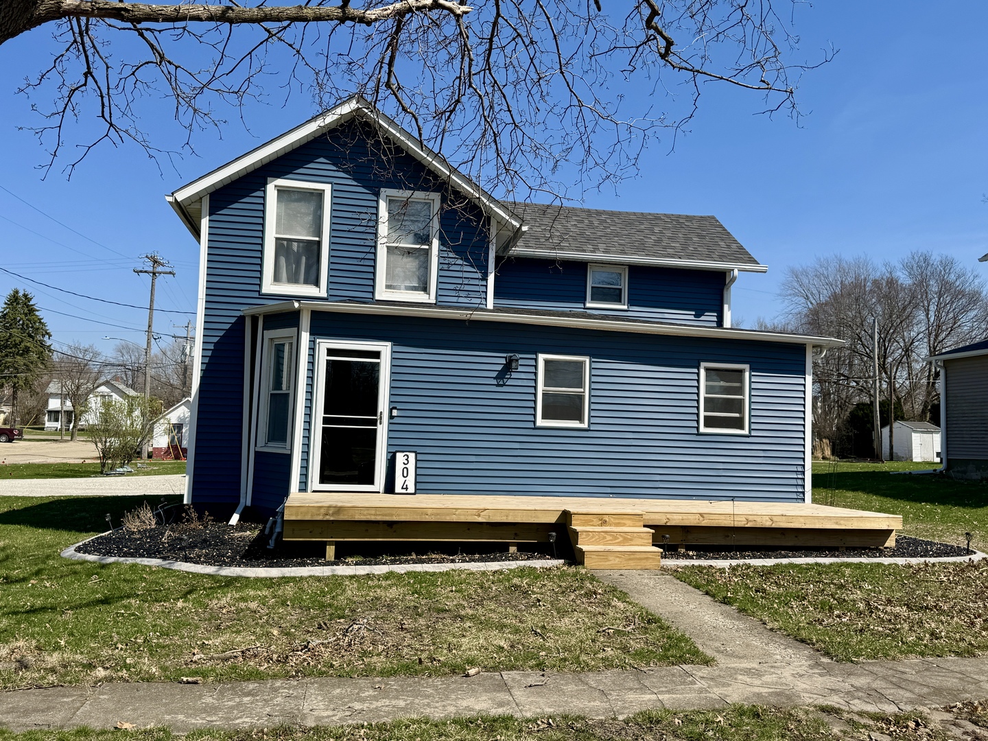 304 South Church Street Sheffield, IL 61361 - Photo 22 of 23 a view of a house with a yard