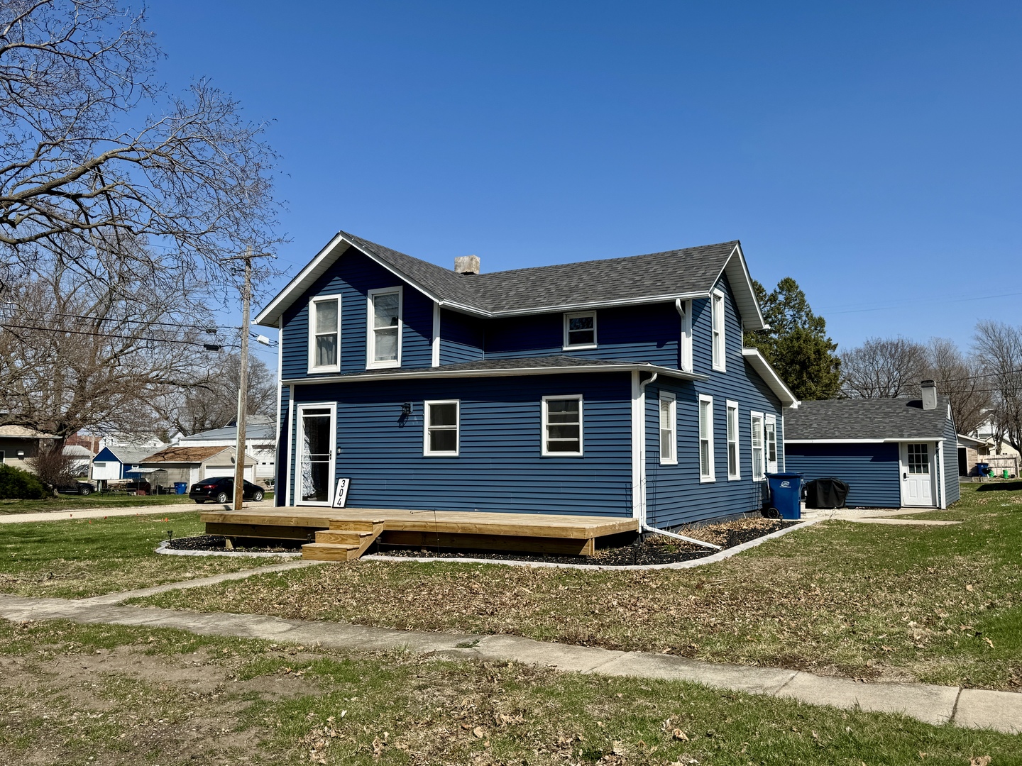 304 South Church Street Sheffield, IL 61361 - Photo 23 of 23 a front view of a house with a yard