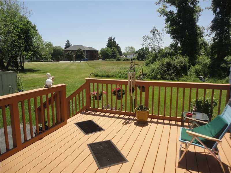 Patio/Deck. Looking out at LARGE town-owned lot.