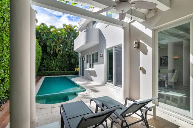 a view of yard with patio