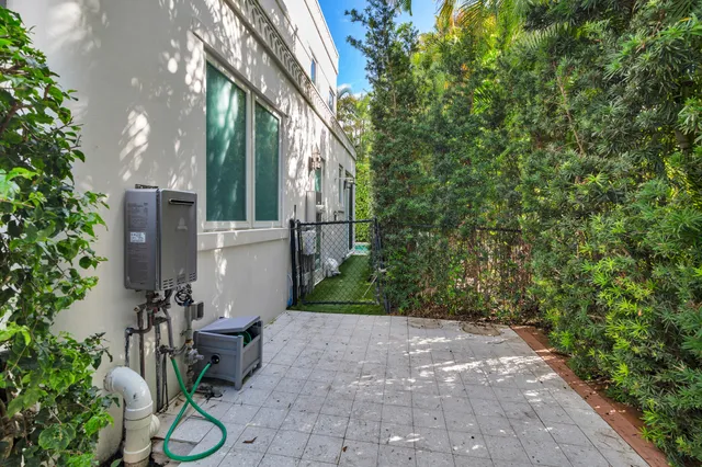 a view of a patio in backyard