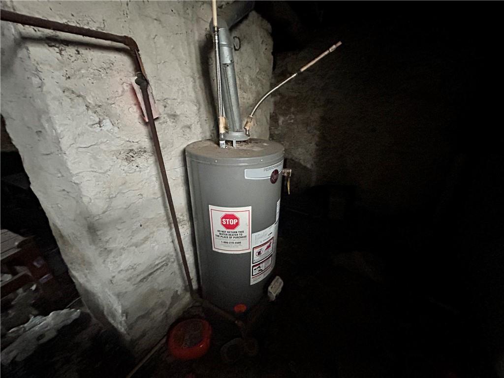 553 Price Avenue Braddock, PA 15104 - Photo 13 of 15 a bathroom with a toilet and a shower