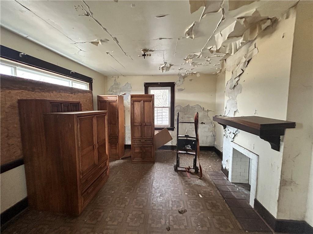 553 Price Avenue Braddock, PA 15104 - Photo 6 of 15 a view of a hallway with washer and dryer