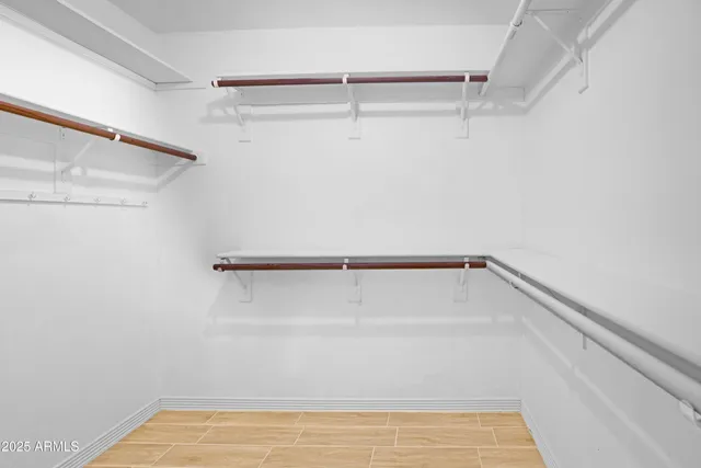 a view of a room with racks on the wall