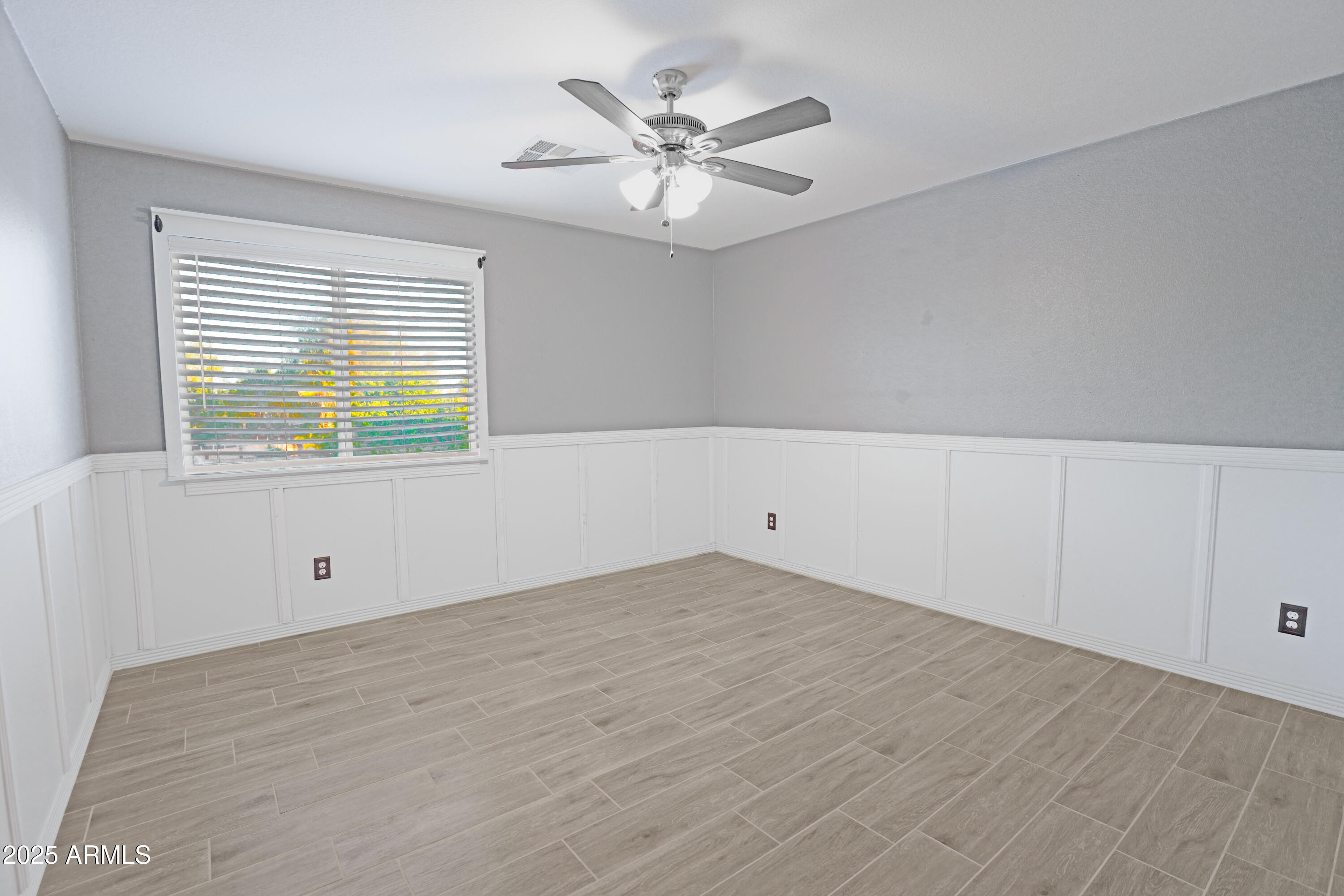15727 West Rimrock Street Surprise, AZ 85374 - Photo 18 of 29 a view of an empty room with a window
