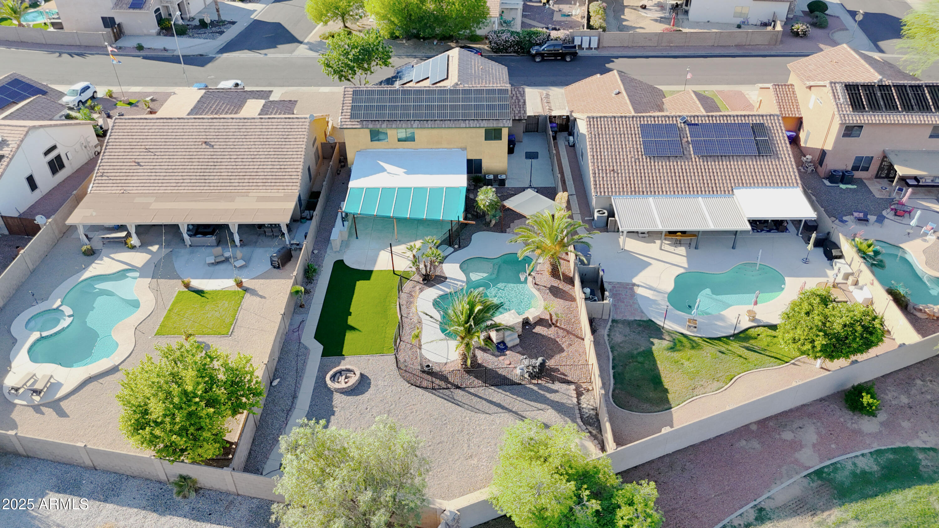 15727 West Rimrock Street Surprise, AZ 85374 - Photo 21 of 29 an aerial view of residential houses with yard