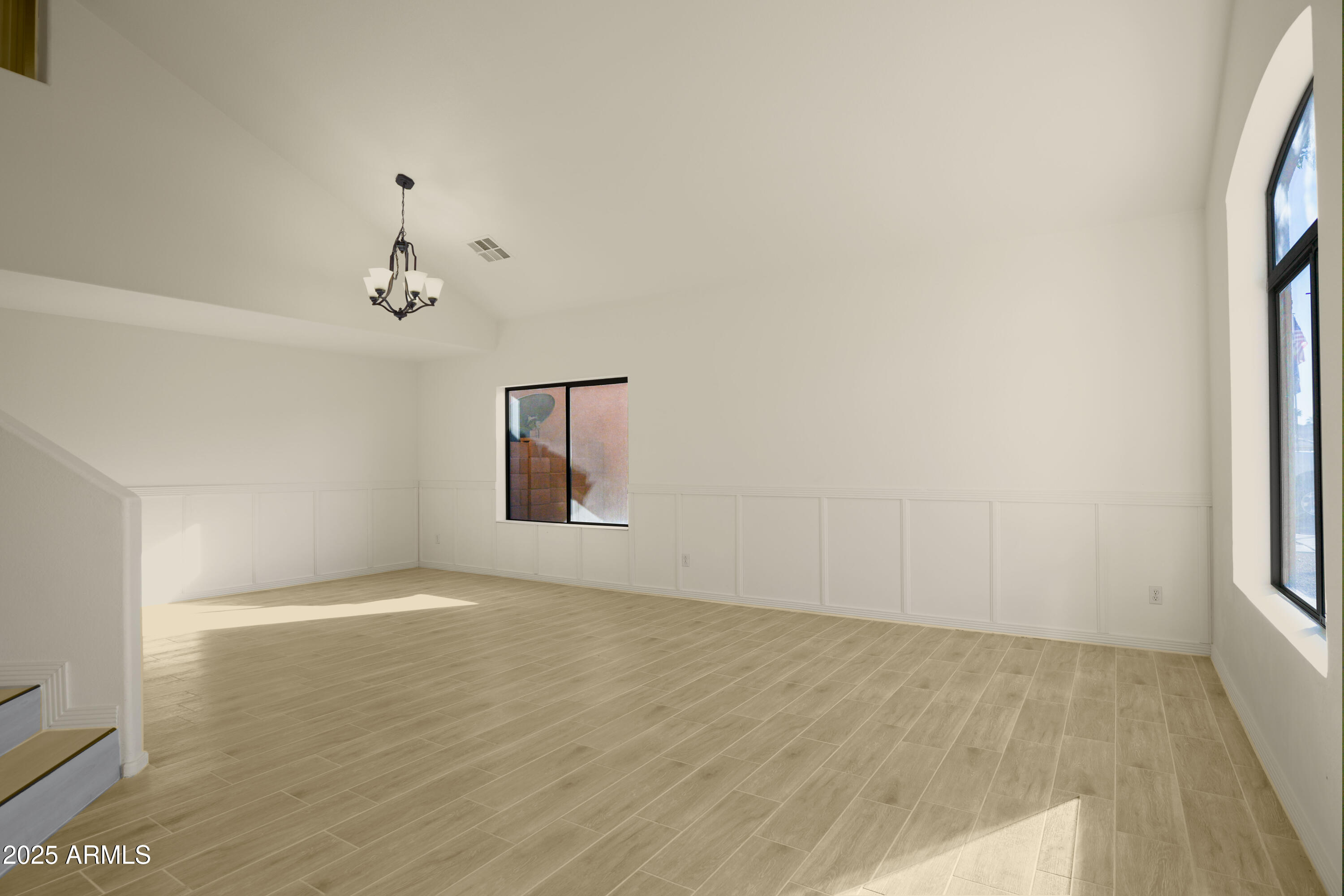 15727 West Rimrock Street Surprise, AZ 85374 - Photo 7 of 29 a view of a room with wooden floor and window