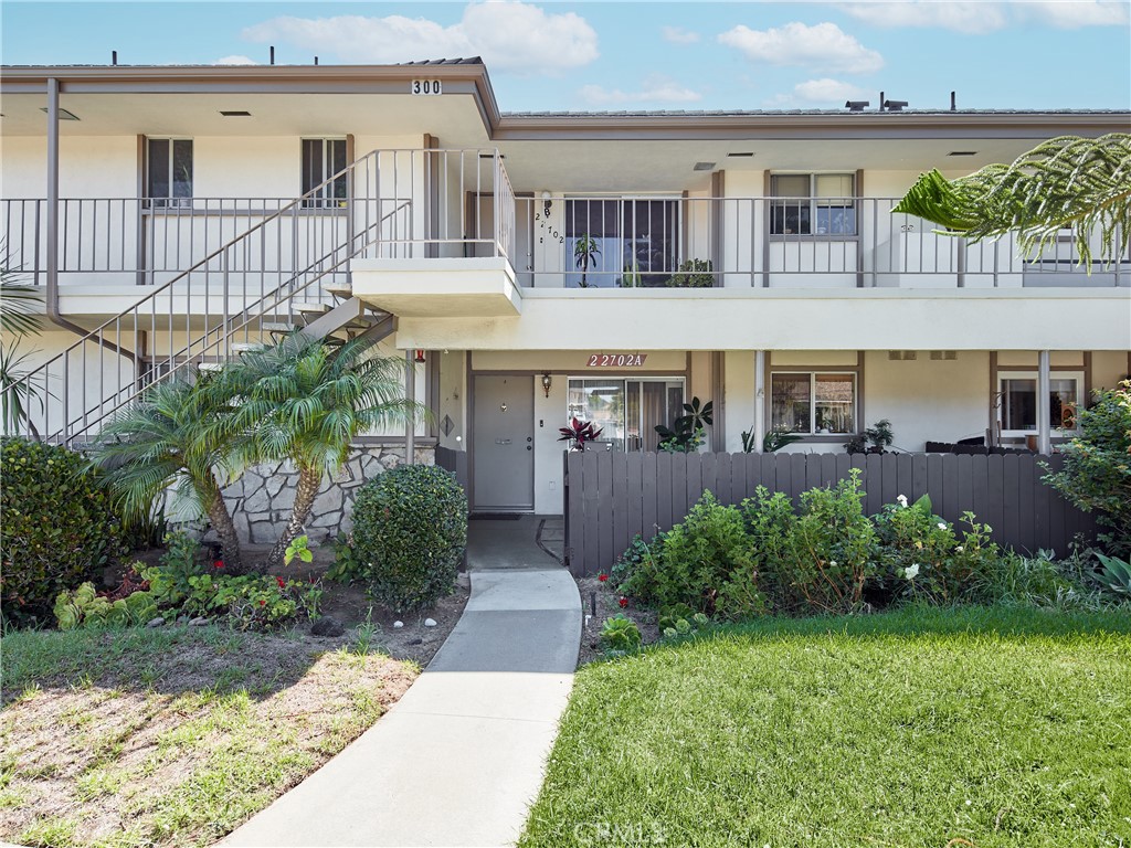 22702 Nadine Circle, Unit A Torrance, CA 90505 - Photo 1 of 22 a front view of a house with a garden