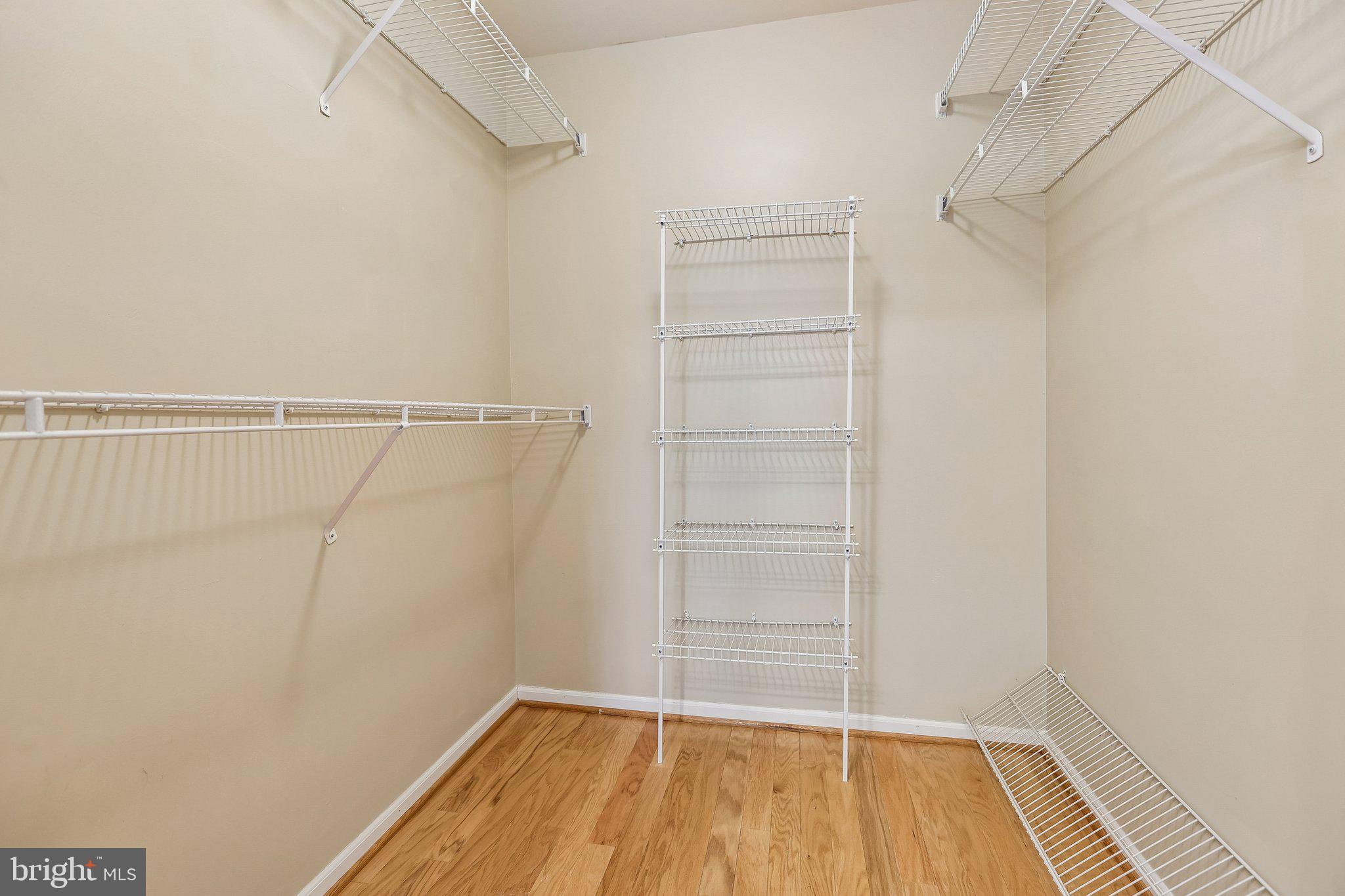 624 Brickhouse Road Princeton, NJ 08540 - Photo 32 of 43 a view of walk in closet with empty racks