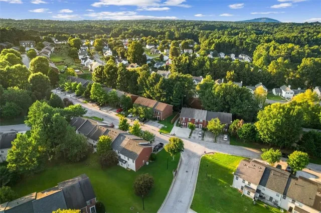 an aerial view of a house with a garden