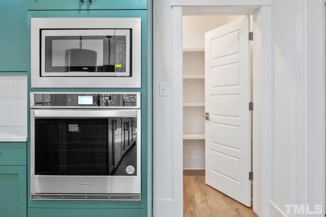 a view of a hallway with entryway